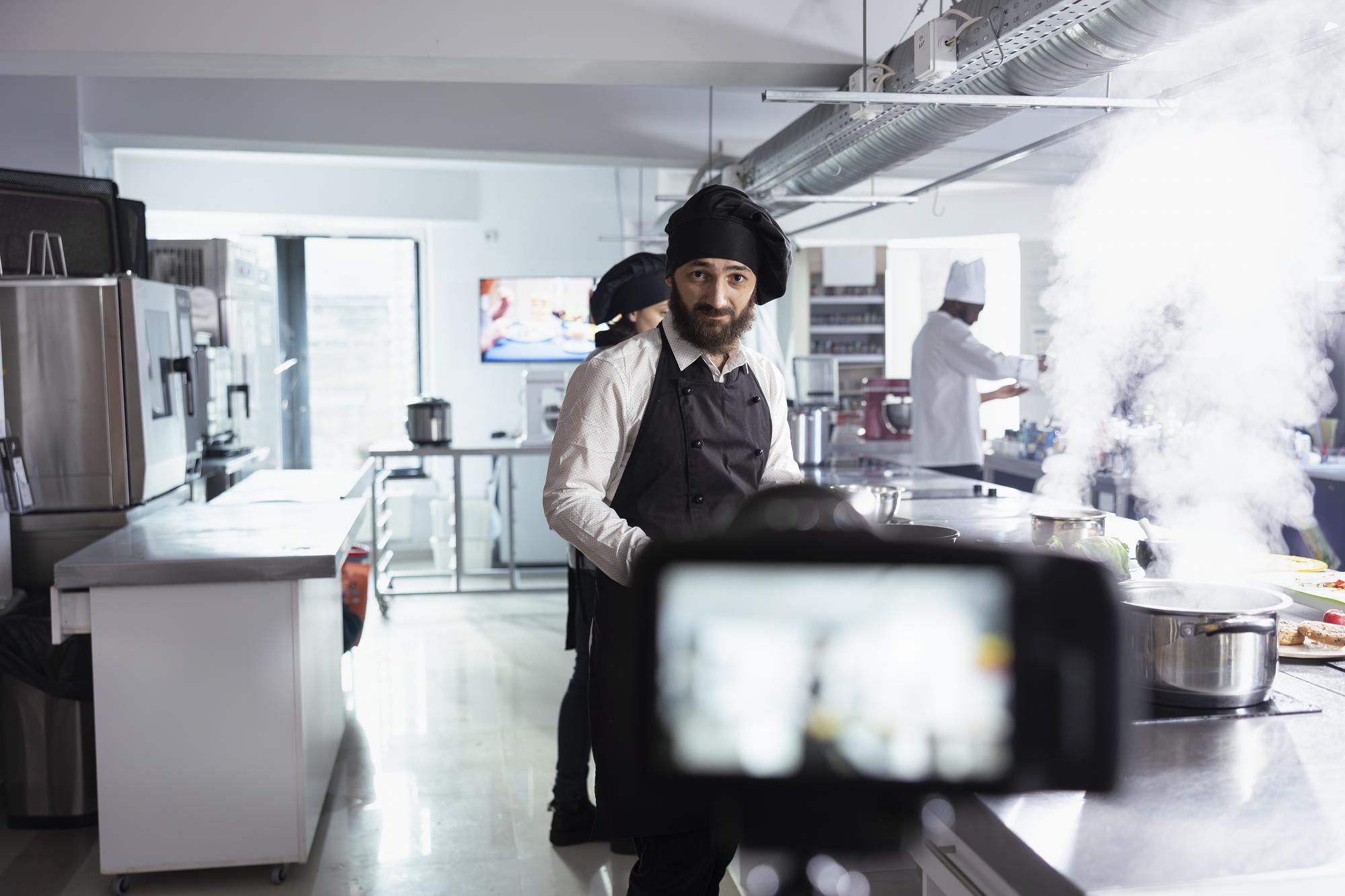 Chef calibrating modern kitchen equipment